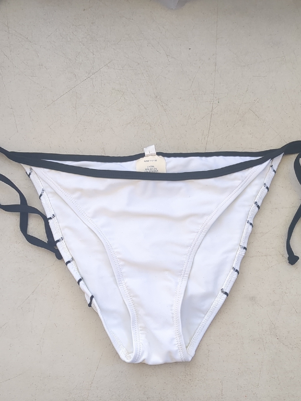 Nicolita White Bikini Bottom with Black Trim and Side Ties